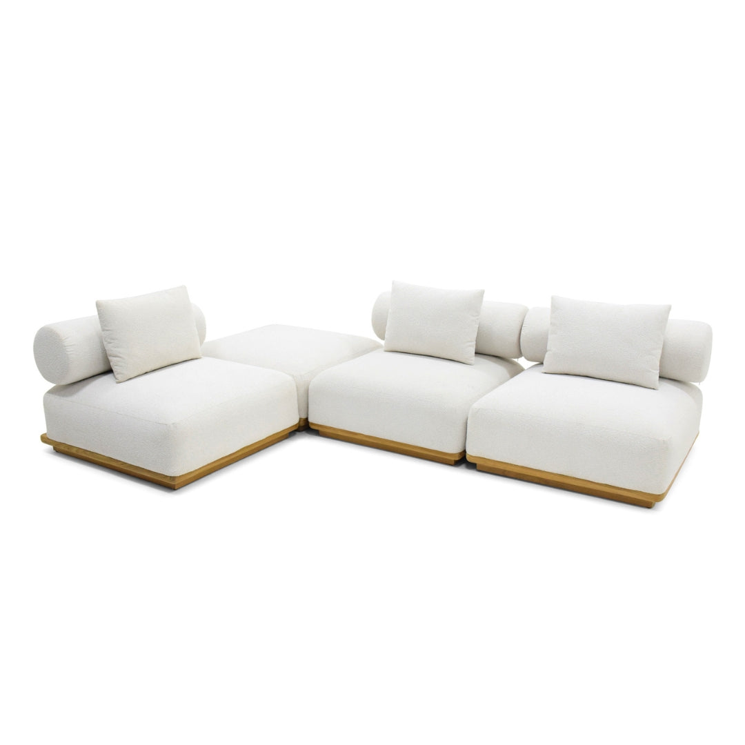 A modern modular outdoor sectional sofa with thick white cushions and a light natural wood base, shown on a plain white background.