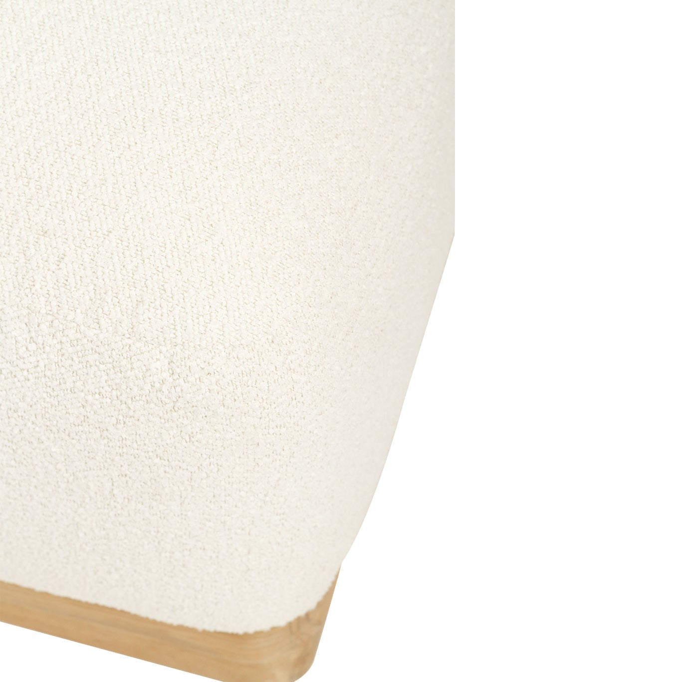Close-up of a textured off-white upholstered corner with a light natural wood edge, shown against a plain white background.