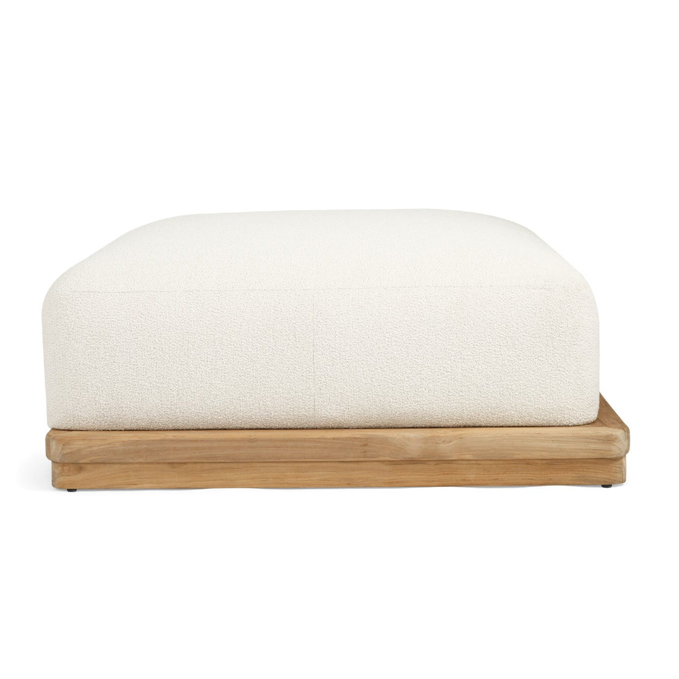 A modern low-profile ottoman or bench with a thick, square, off-white textured cushion on a solid light natural wood base, shown against a plain white background.