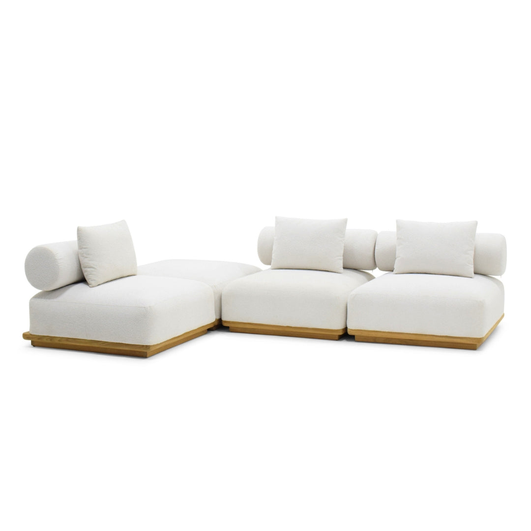 A modern modular sectional sofa with thick white cushions and light natural wood bases, shown on a clean white background.