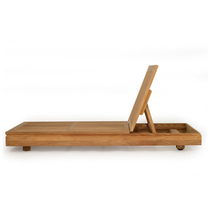 A light brown wooden chaise lounge chair with a slanted backrest and a built-in storage tray underneath, shown from a side profile on a white background.