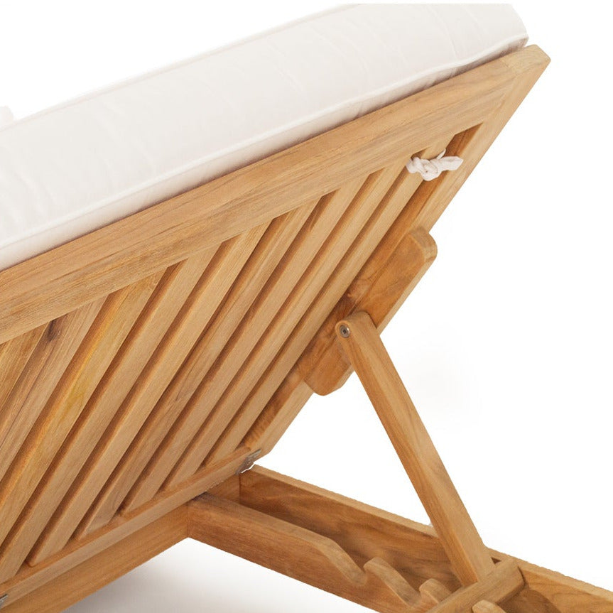 A close-up of a wooden folding lounge chair with a white cushion on a plain white background.