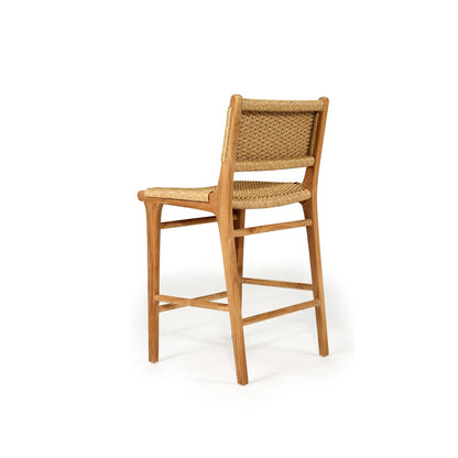 Wooden bar stool with woven backrest on a white background
