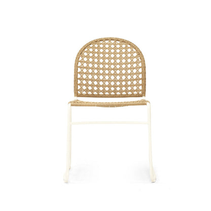 A modern dining chair featuring a natural woven cane backrest and seat on a white metal frame, shown against a plain white background.