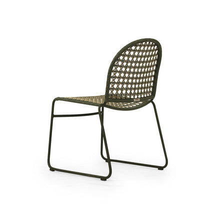 A modern outdoor dining chair with a dark olive green metal frame and a woven rattan seat and backrest, shown from a three-quarter angle on a white background.