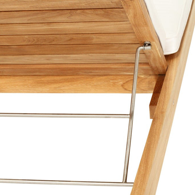 Close-up of a wooden outdoor lounge chair showing the slatted backrest, side frame, and metal support legs on a white background.