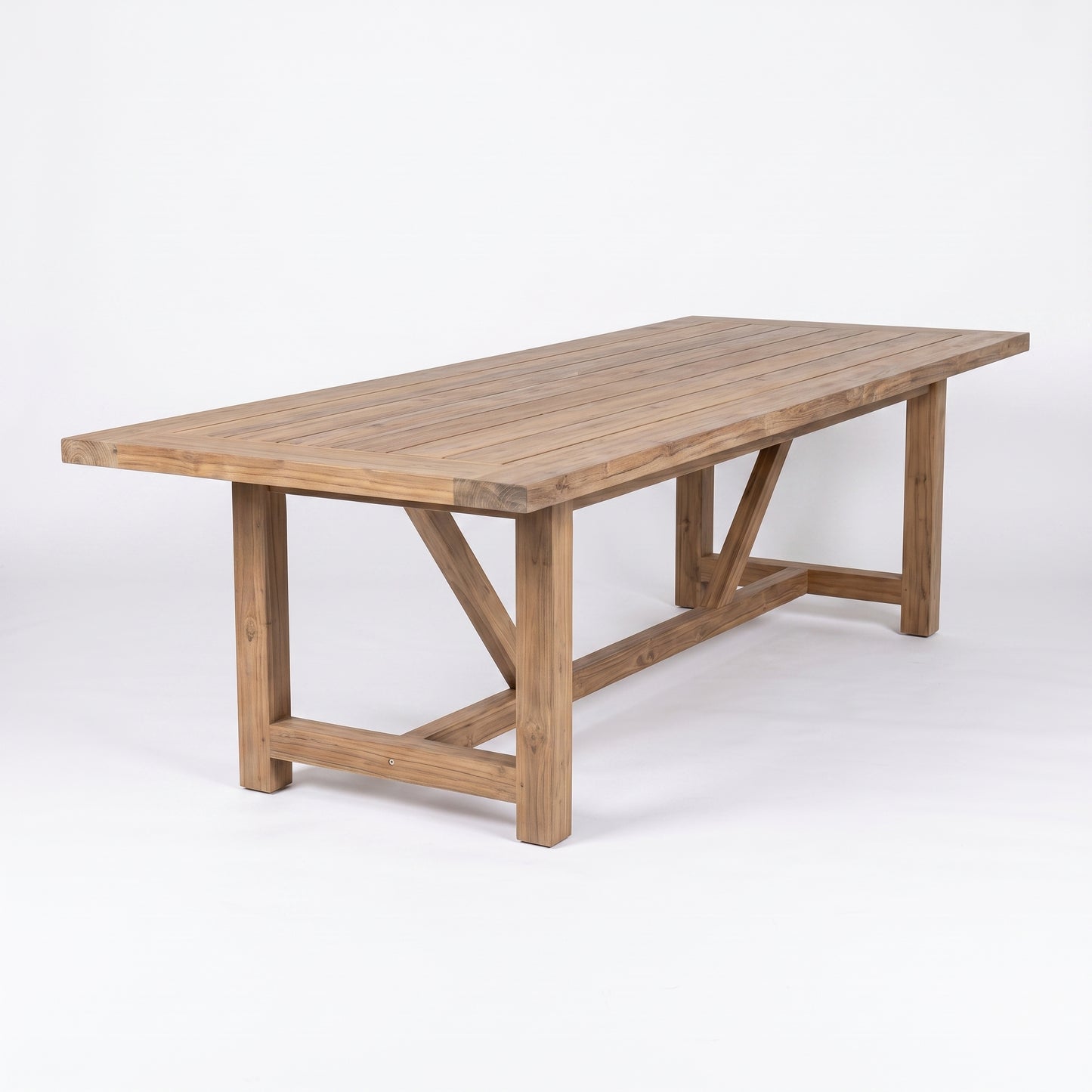A rectangular wooden dining table with a slatted top and trestle-style legs, shown on a clean white studio background.