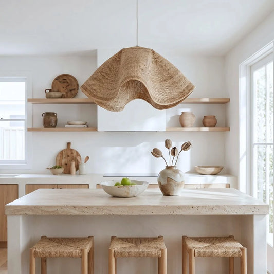Modern kitchen with wooden shelves, pendant light, and stools.