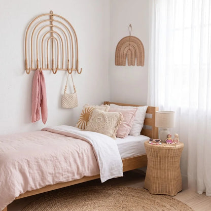 Sun Republic natural rattan decorative wall decor styled in a modern coastal boho girls bedroom 