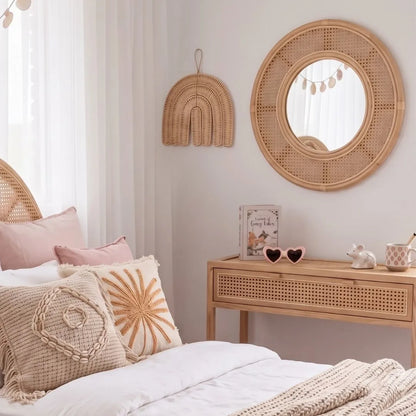 Sun Republic natural rattan decorative wall decor styled in a modern coastal boho girls bedroom 