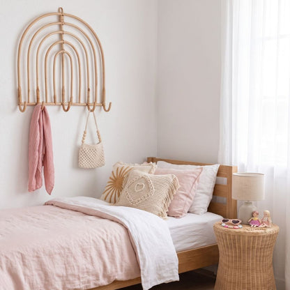 Sun Republic rainbow rattan wall hook styled in a bedroom