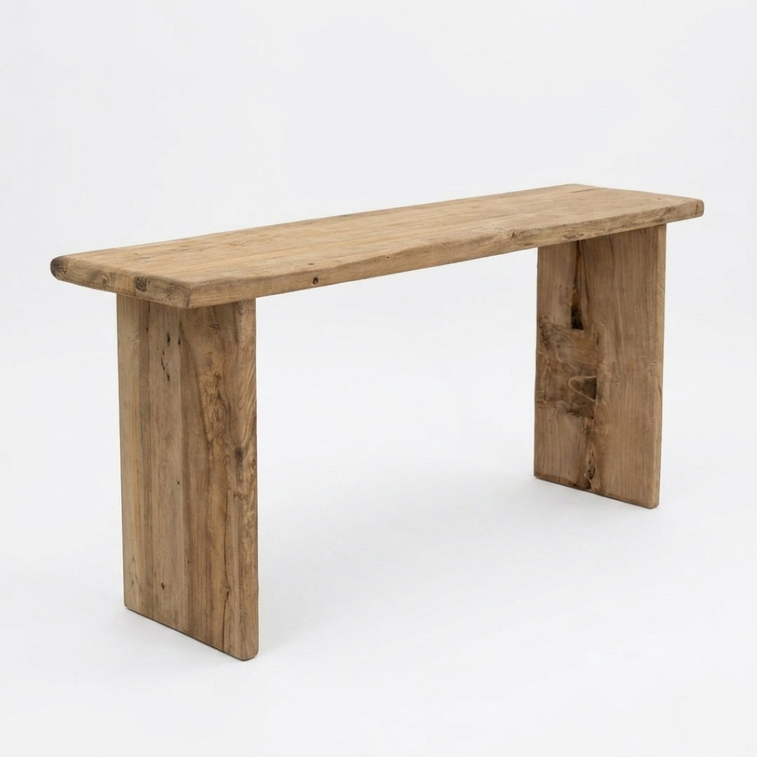 A rustic wooden console table with a thick rectangular slab top and two thick block legs, shown on a clean white background.