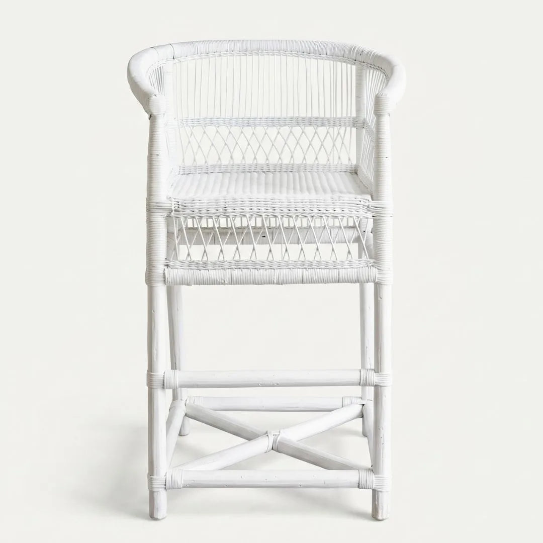 White wicker chair on a white background