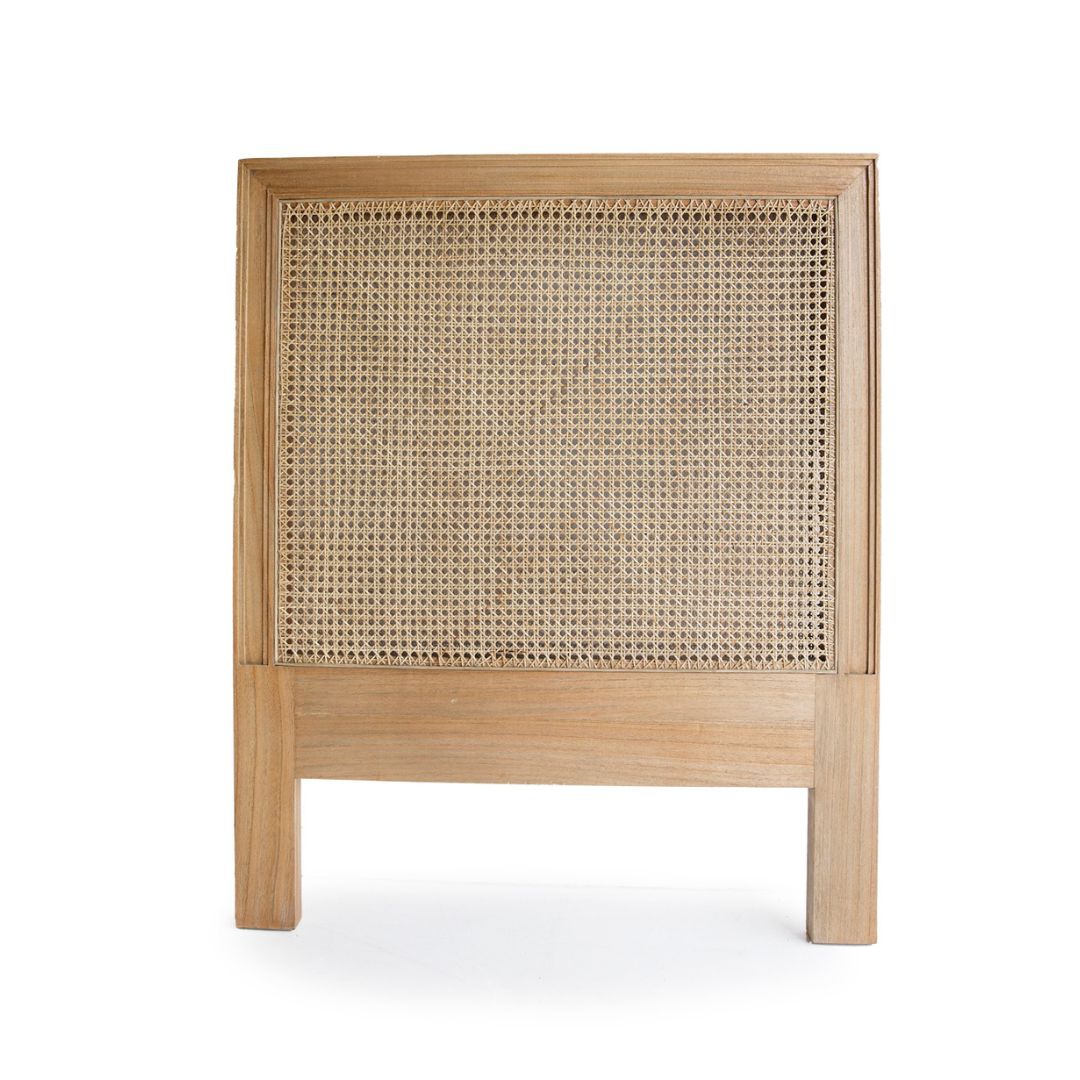 Wooden headboard with woven cane design on a white background