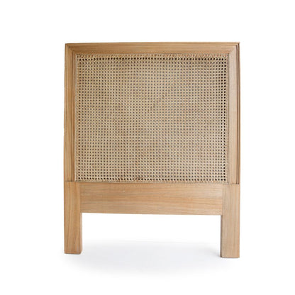 Wooden headboard with woven cane design on a white background