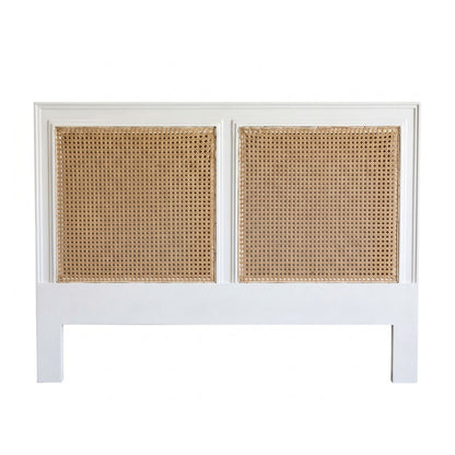 White headboard with rattan panels on a white background