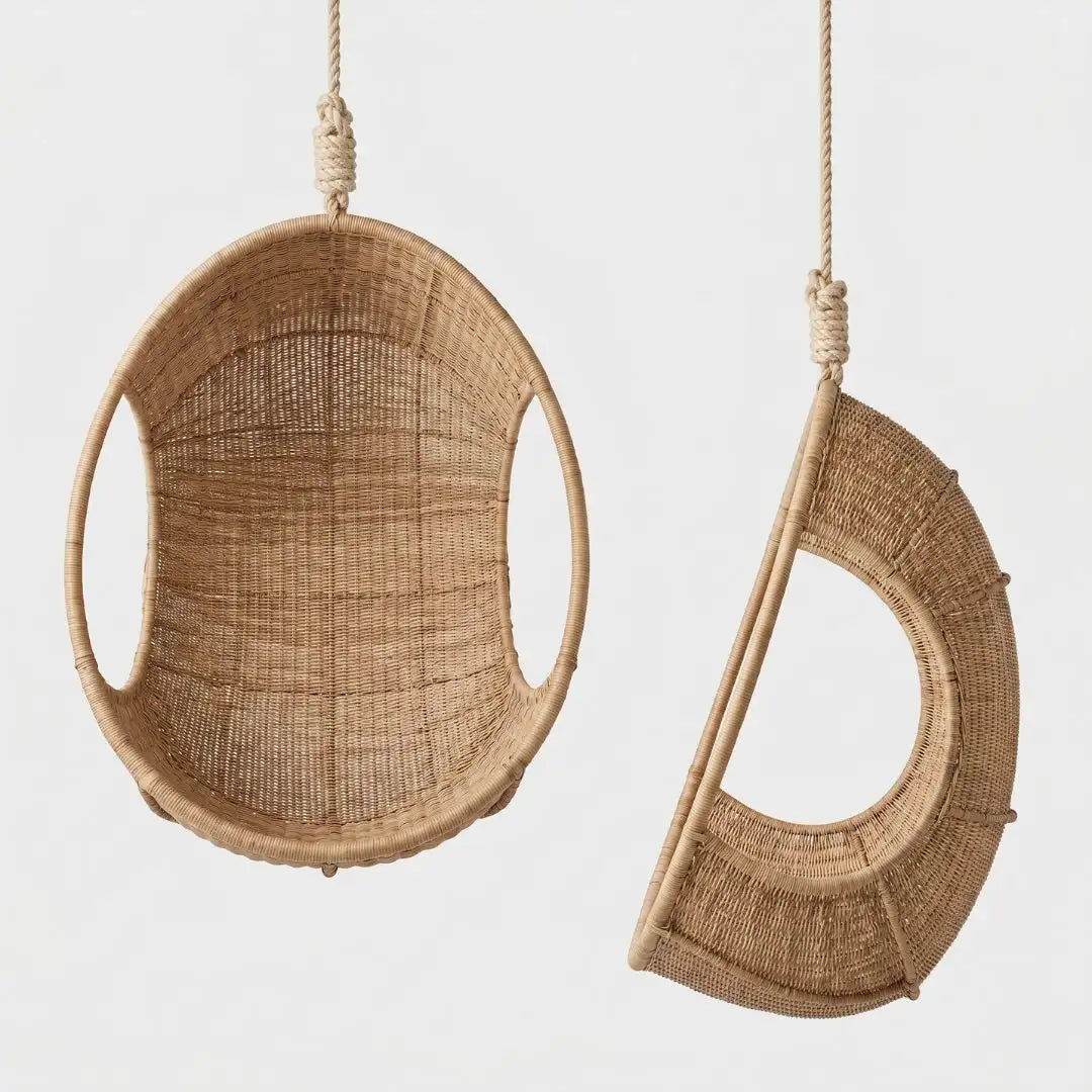 Two woven hanging chairs on a light gray background