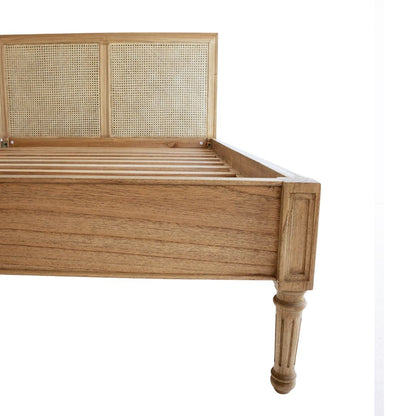 Wooden bed frame with woven headboard on a white background
