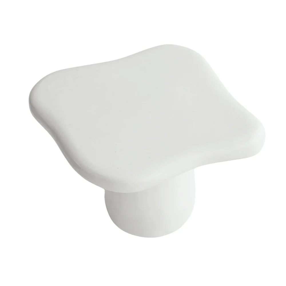 White concrete side table on a white background