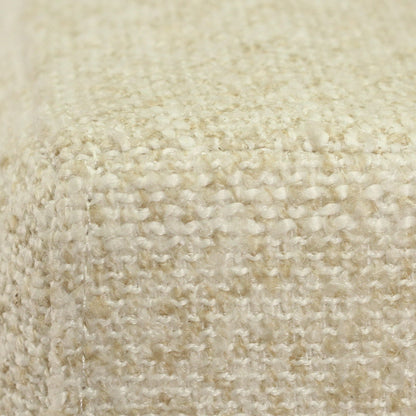 Close-up of a textured woven fabric in a warm cream or off-white color, showing the detailed knit pattern and corner seam.