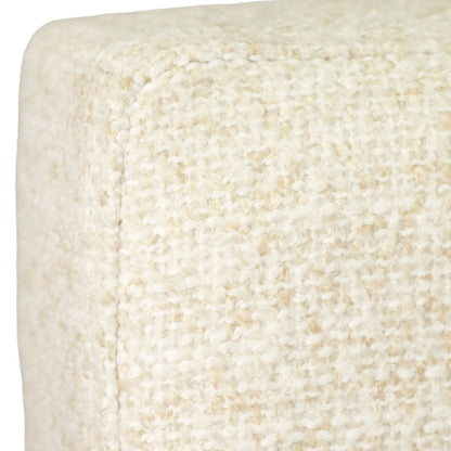 Close-up of a textured fabric upholstery in a warm off-white or cream color, showing the woven material and corner seam.