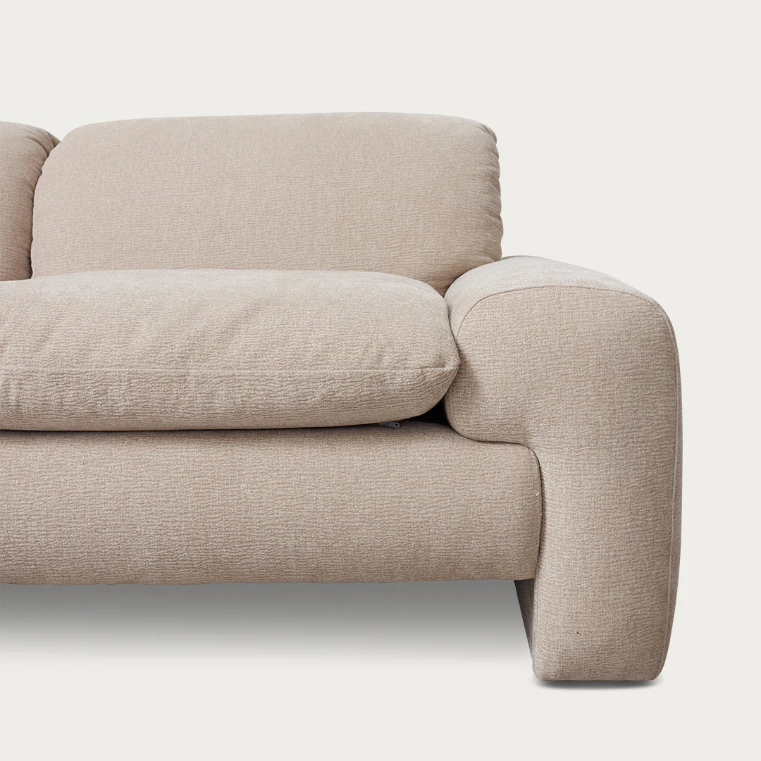 Beige sofa on a white background