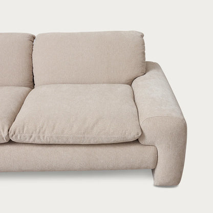 Beige sofa on a white background