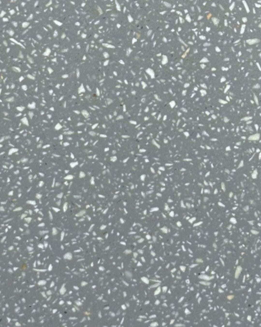 Gray terrazzo pattern with speckles of white and other colors