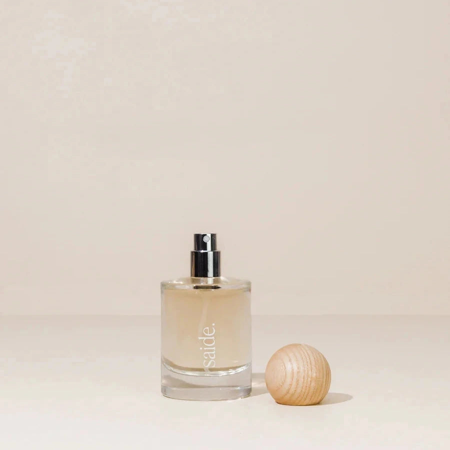 Perfume bottle on a beige background
