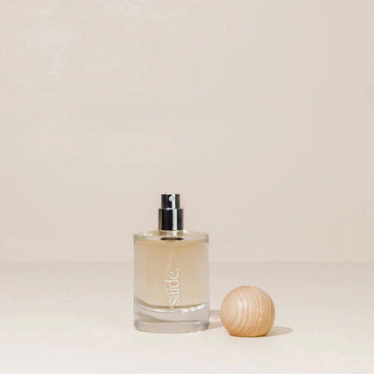 Perfume bottle on a beige background