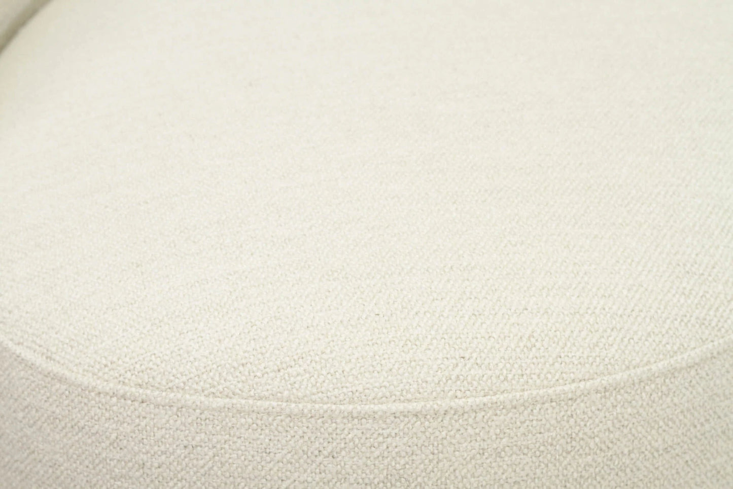 Close-up of a textured white linen sofa