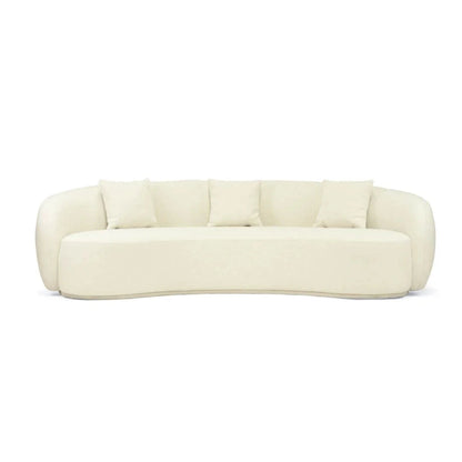Off white colored linen curved sofa on a white background