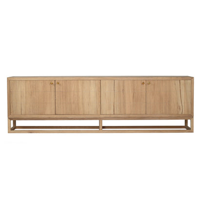 A modern sideboard cabinet made of light natural wood with four doors and small round brass handles, supported by a low open frame base, shown against a plain white background.