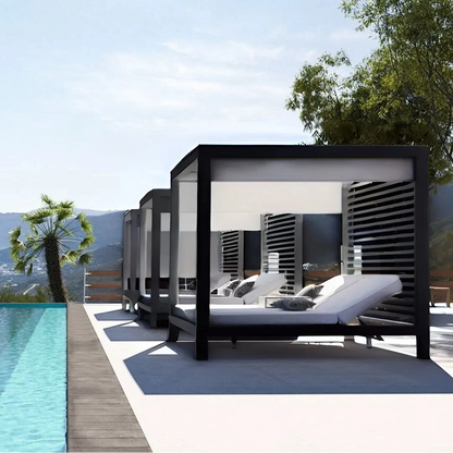 Modern outdoor cabanas by a pool with a scenic background