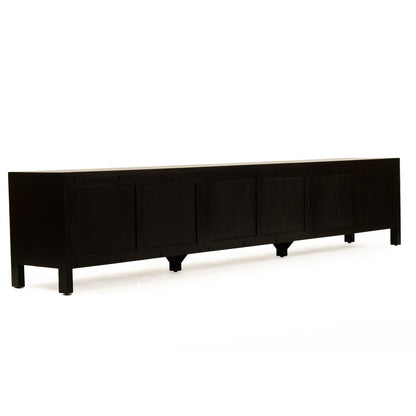 A long, low black wooden sideboard or credenza with four front doors, shown on a plain white studio background.