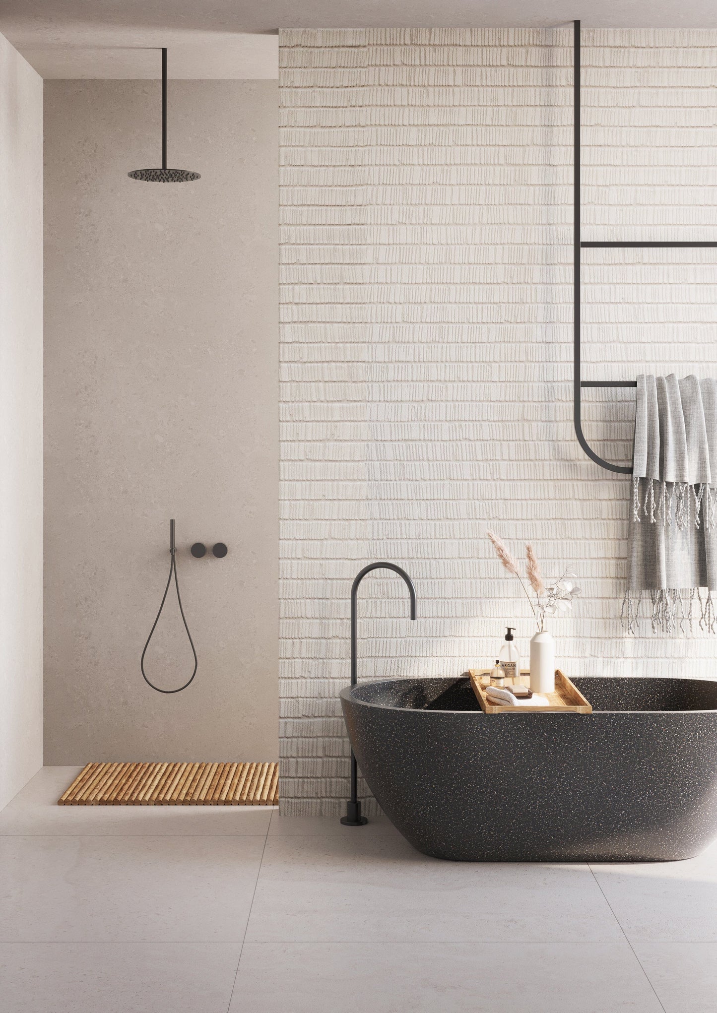 Modern bathroom with a freestanding bathtub, tiled walls, and minimal decor.