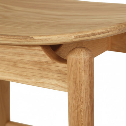 Jansen American Oak Counter Bar Saddle Stool  in Natural on a white background from Sun Republic 