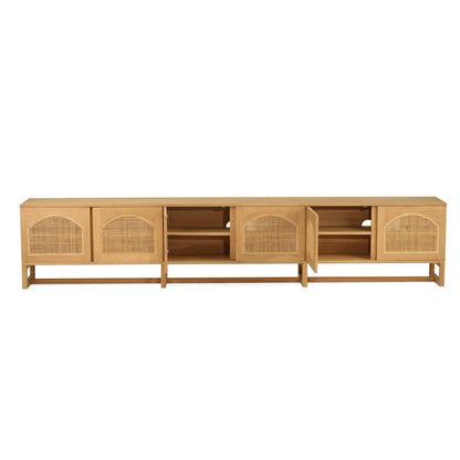 Wooden entertainment unit with rattan doors on a white background