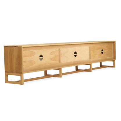 Wooden entertainment unit with rattan doors on a white background