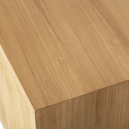 Close-up of a light natural wood grain surface with visible wood texture and a corner edge showing the side panel.
