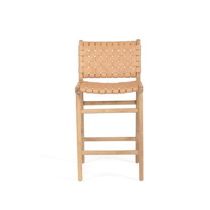 A natural tan nude-colored woven leather and teak wood counter stool with a flat, seat and a straight, sturdy teak frame.