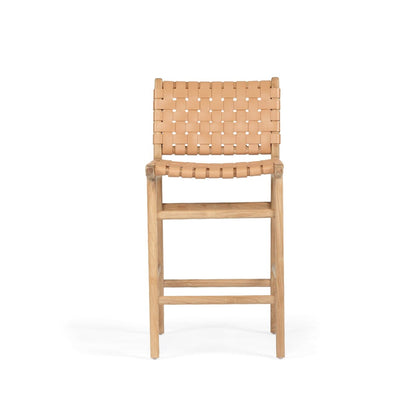 A natural tan nude-colored woven leather and teak wood counter stool with a flat, seat and a straight, sturdy teak frame.