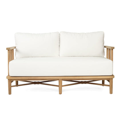 Wooden sofa with white cushions on a white background
